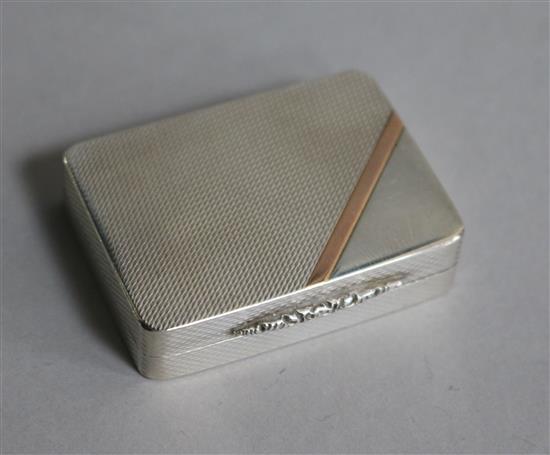 A modern engine turned silver and rose gold pill box by Peter John Doherty, Birmingham, 1993, 45mm.